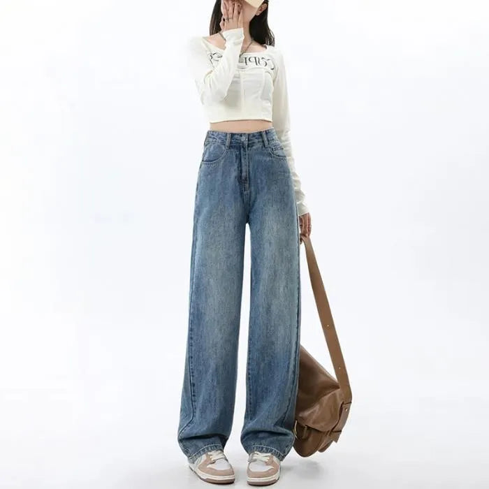 Women's retro blue wide leg jeans with high waist and straight leg design on denim background