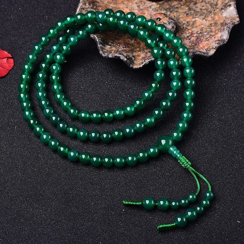 Natural green agate 108 Thangka pendant multi-circle bracelet on display
