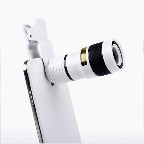 12X telephoto phone camera lens with clip attached to smartphone showing long distance zoom capability