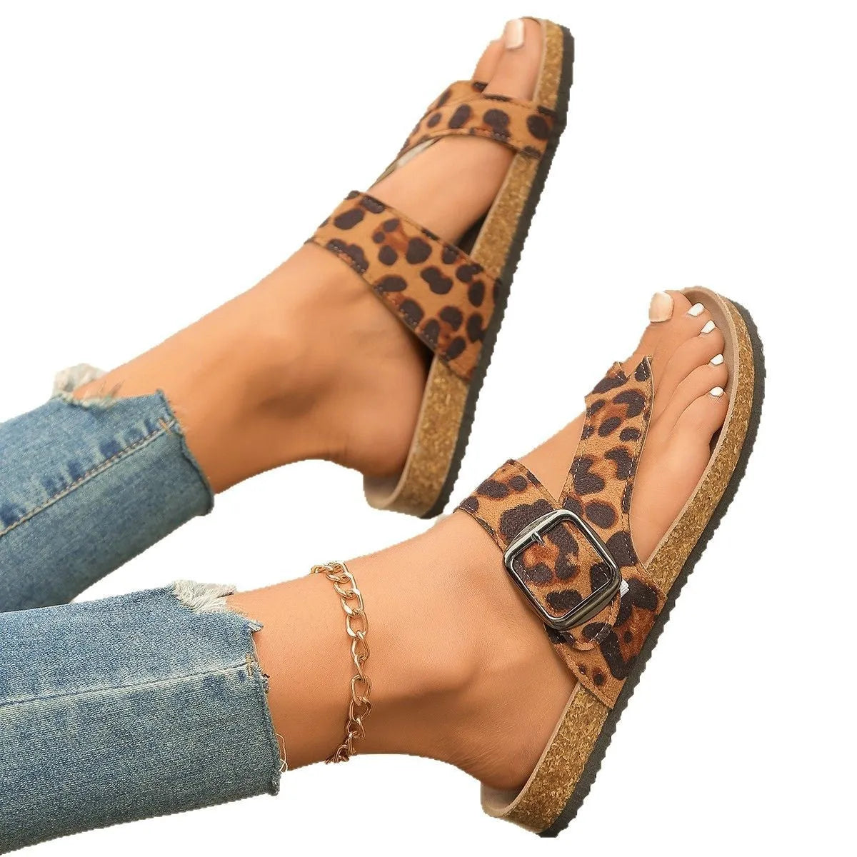 Roman style toe covering leopard slippers with wooden sole on neutral background