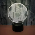 3D football night light with colourful projection on acrylic display, ABS base, showing colour-changing options.