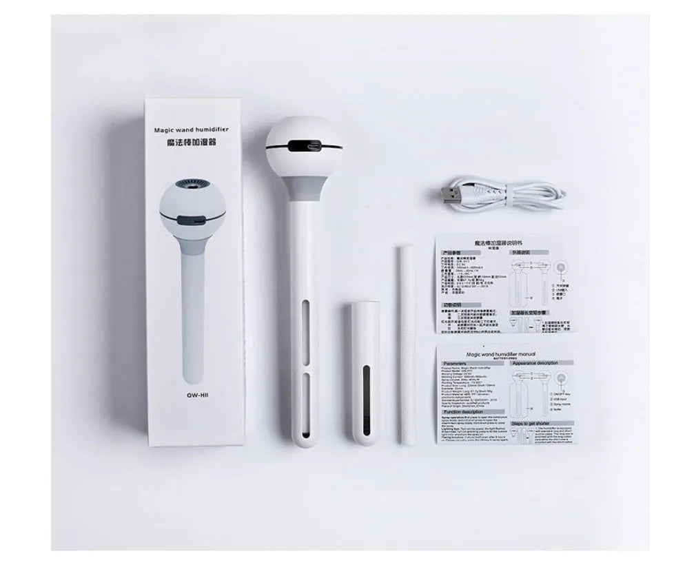 Columnar magic wand humidifier in pink or white with USB port and mechanical controls.