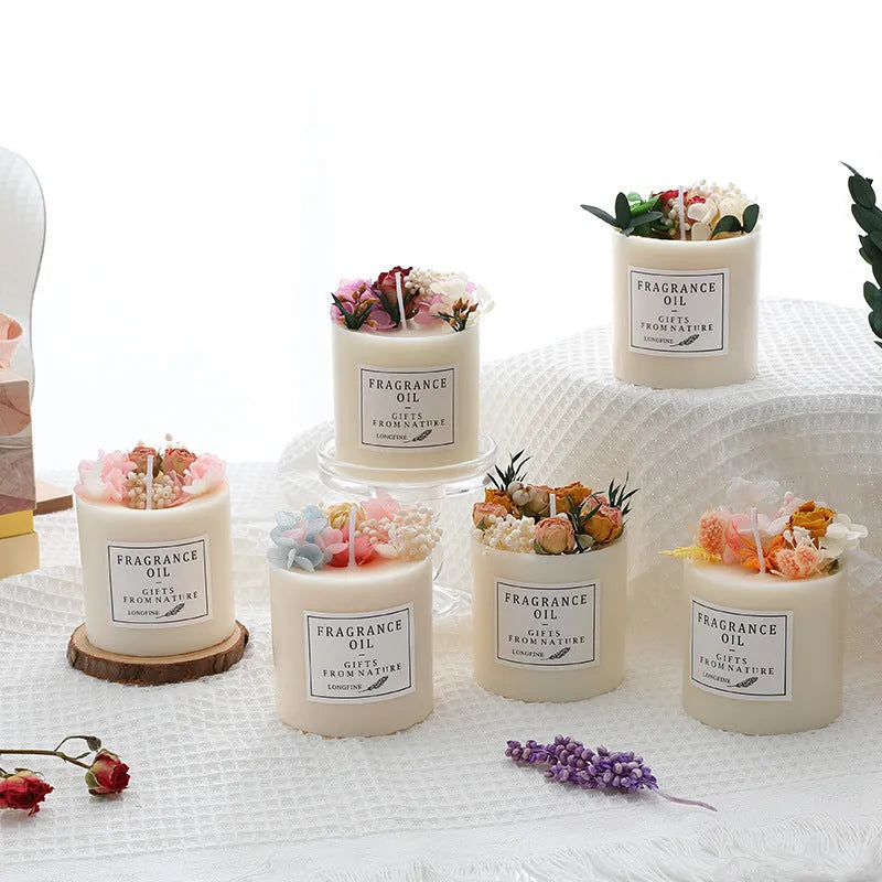 Aromatherapy candle with dried flowers on top, shown in various scent style options.