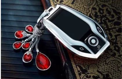 Suede key case with zinc alloy front frame in Classic Black, Charming Red, and Saddle Brown colour options