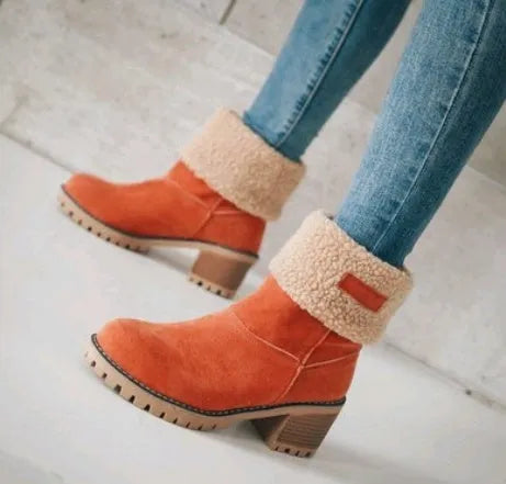 Women's mid-tube suede snow boots with thick construction and flat heel in multiple colour options