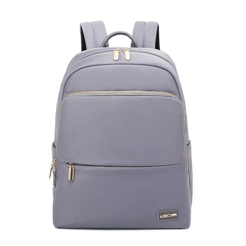 Oxford cloth women's backpack in black and purplish grey, showing large capacity and design features.