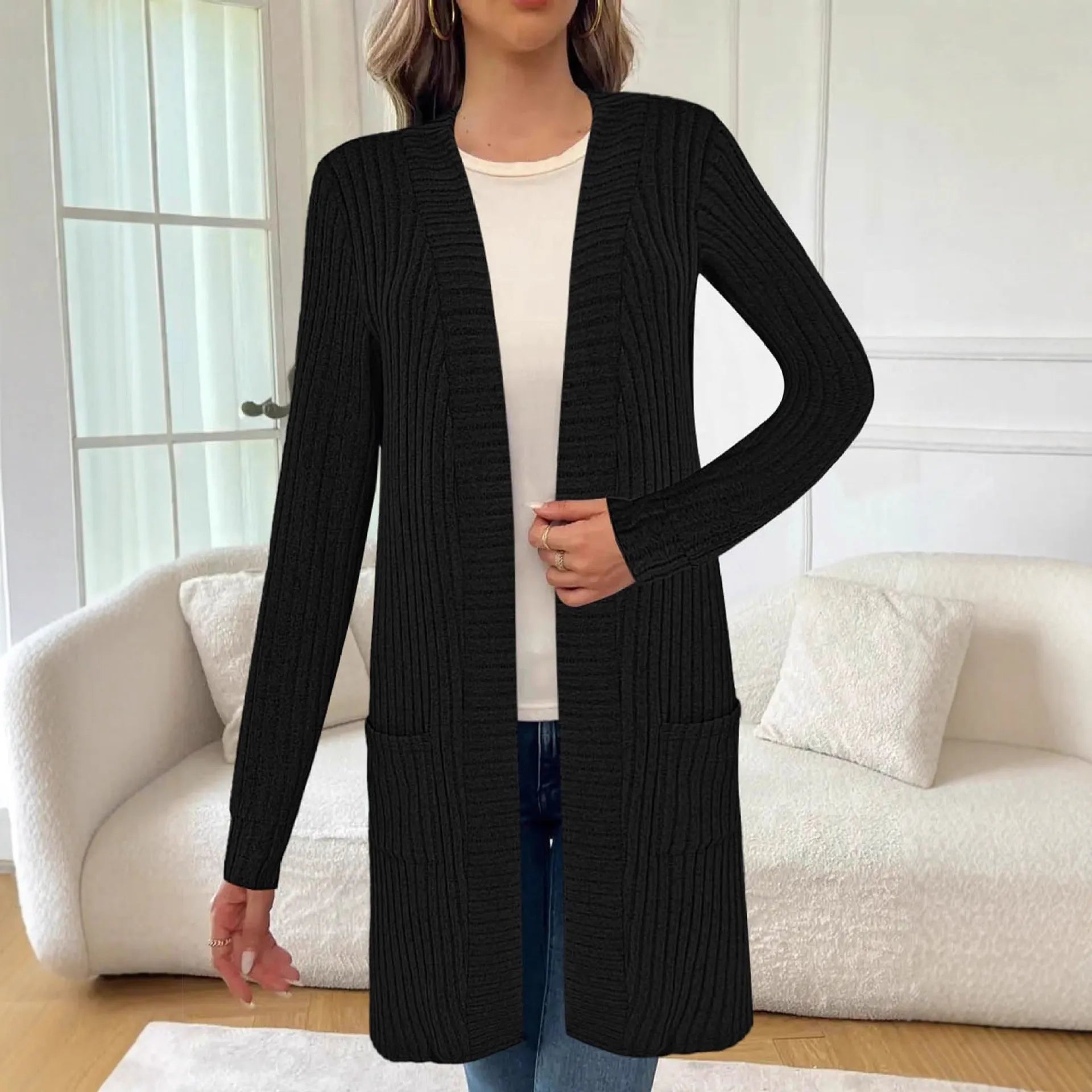 Loose fit knitted cardigan jacket in black colour with long sleeves and open front design