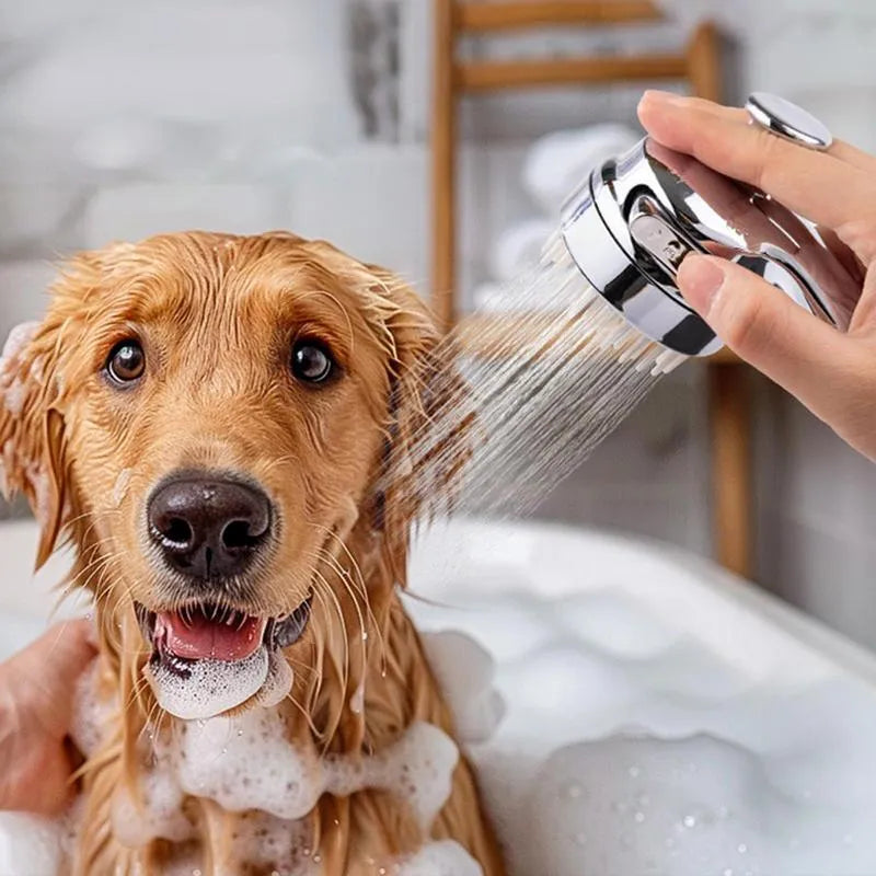 Silver 2 in 1 dog shower attachment with soft silicone comb teeth and ergonomic grip on white background