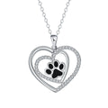 Women's silver-tone necklace with dog paw footprint pendant on cross chain