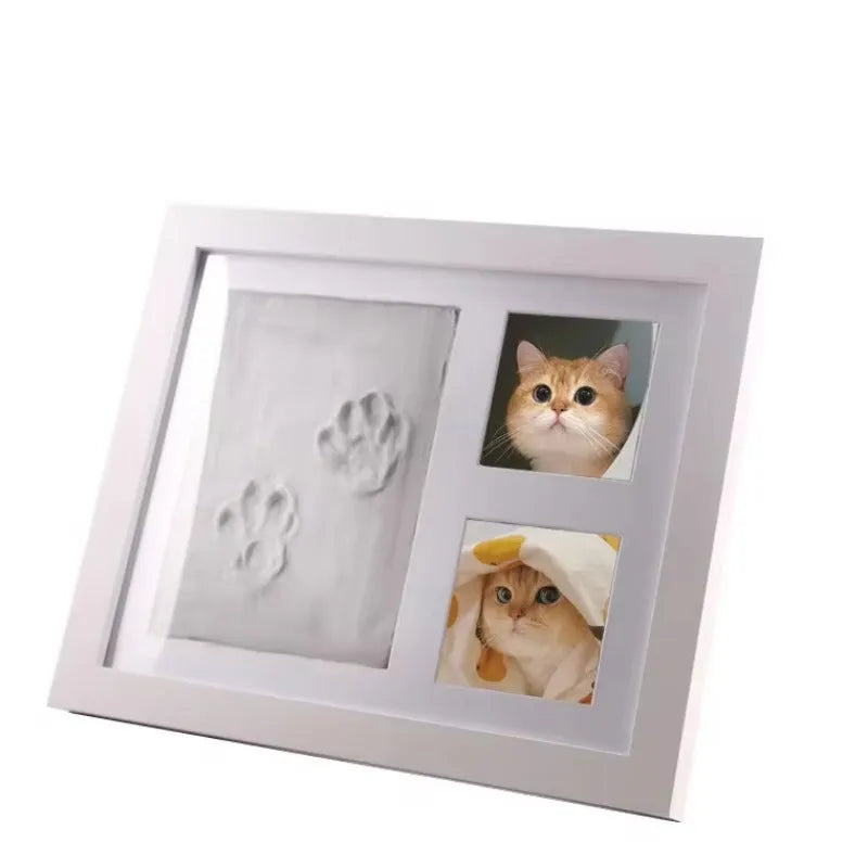 Pet hand and foot print photo frame with black frame and white mud paw print
