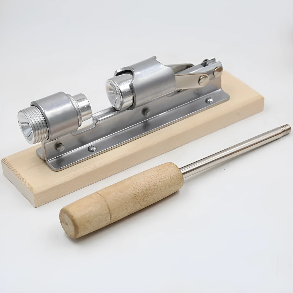 Mechanical walnut cracker with wood body and aluminium mechanism on a table