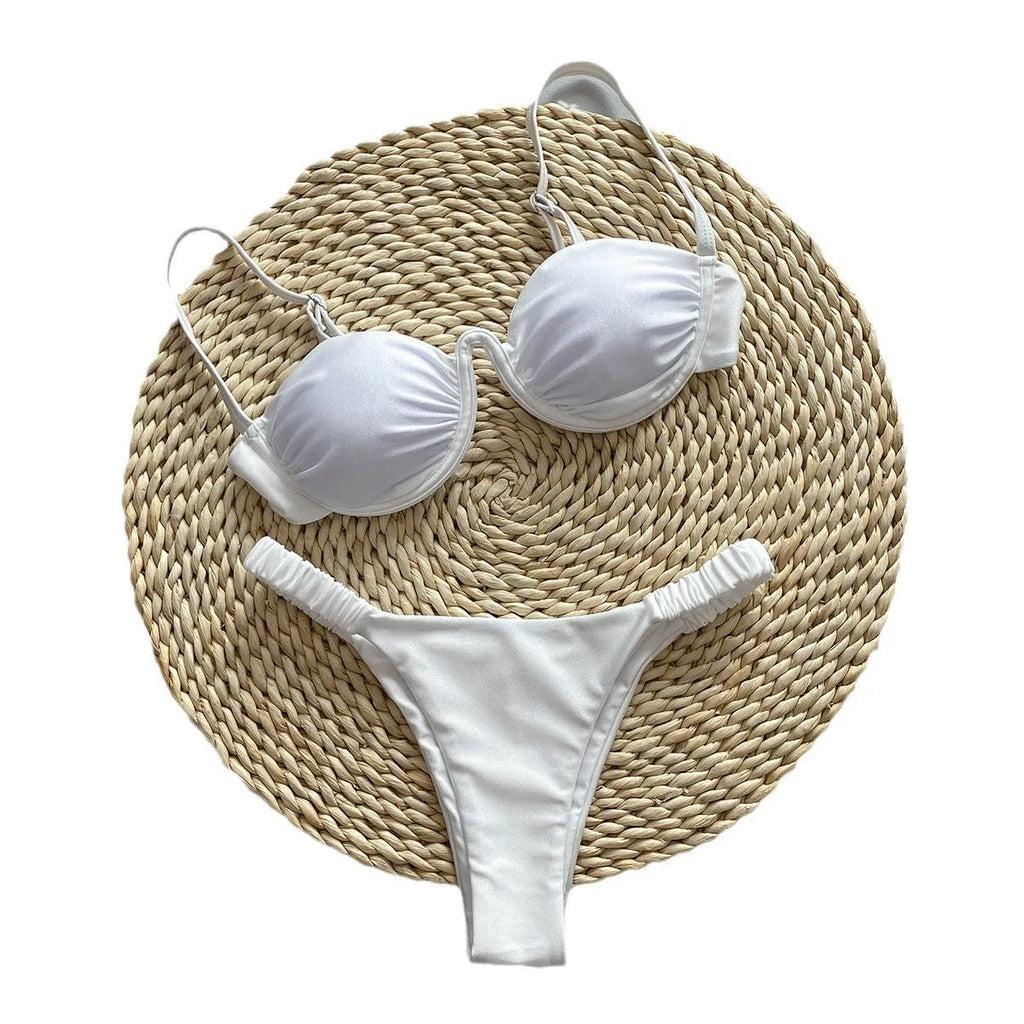 Women's black underwire bikini swimsuit set with briefs style on a mannequin.