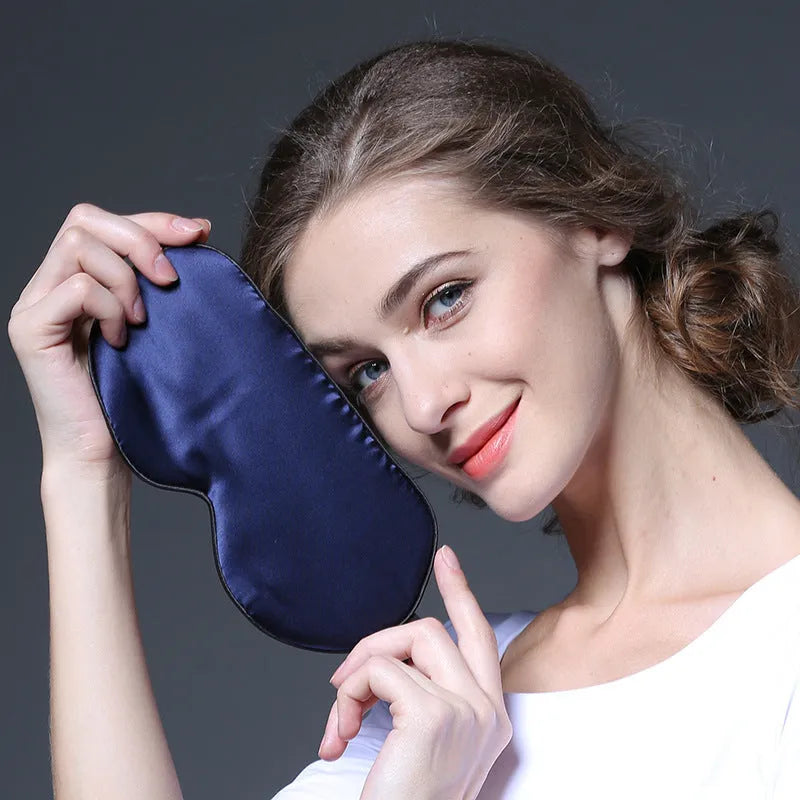 Double-sided mulberry silk eye mask with embroidered print in various colours measuring 22x11cm