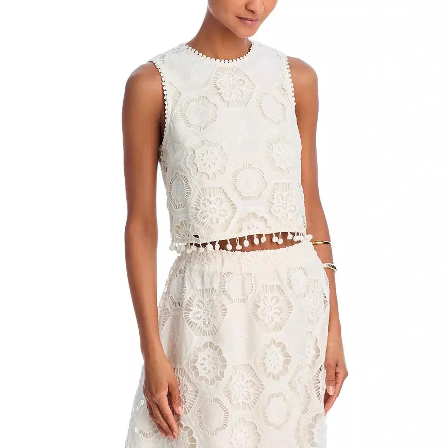 White women's retro style suit set with embroidery, featuring a sleeveless top and a long skirt.