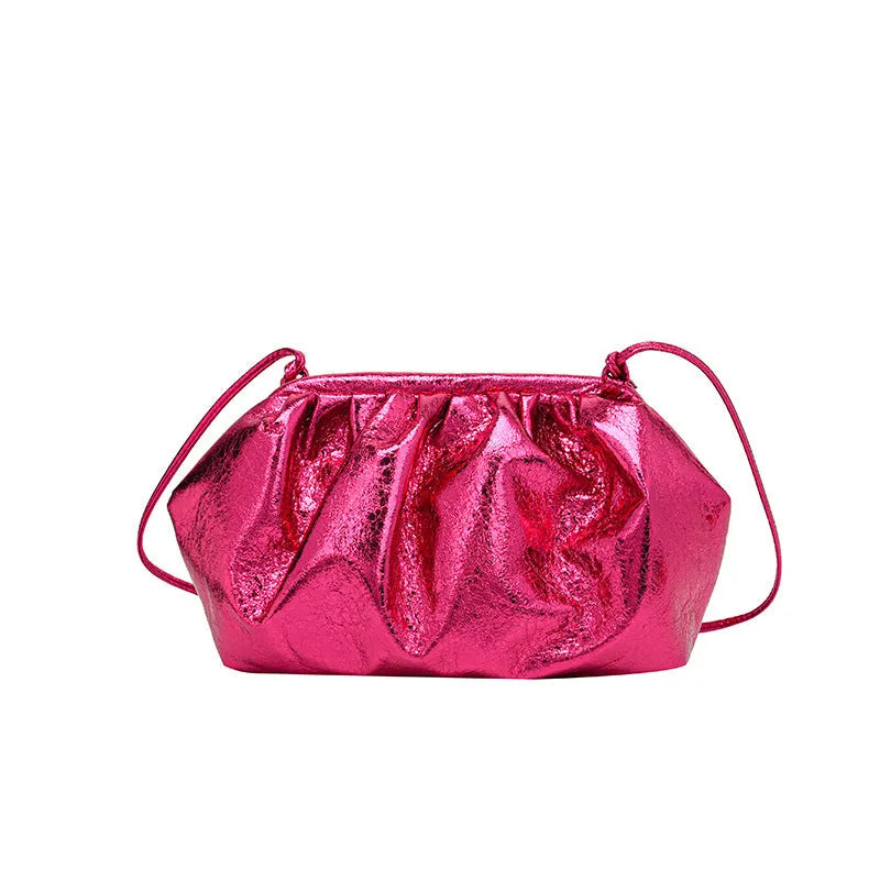 Shell-shaped PU leather crossbody bag with adjustable strap and internal organiser compartments
