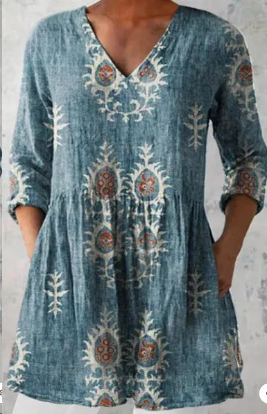Women's printed loose dress with 3/4 sleeves and wide waist design in floral pattern
