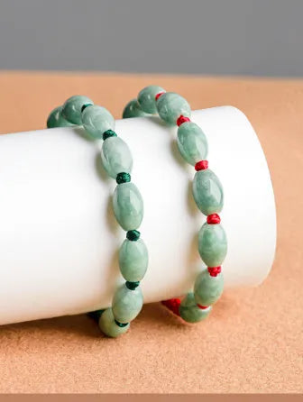Natural jade bracelet in dark green for men with 9 beads, national style, on display with certificate.