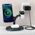 Black three-in-one magnetic wireless charger on a surface.
