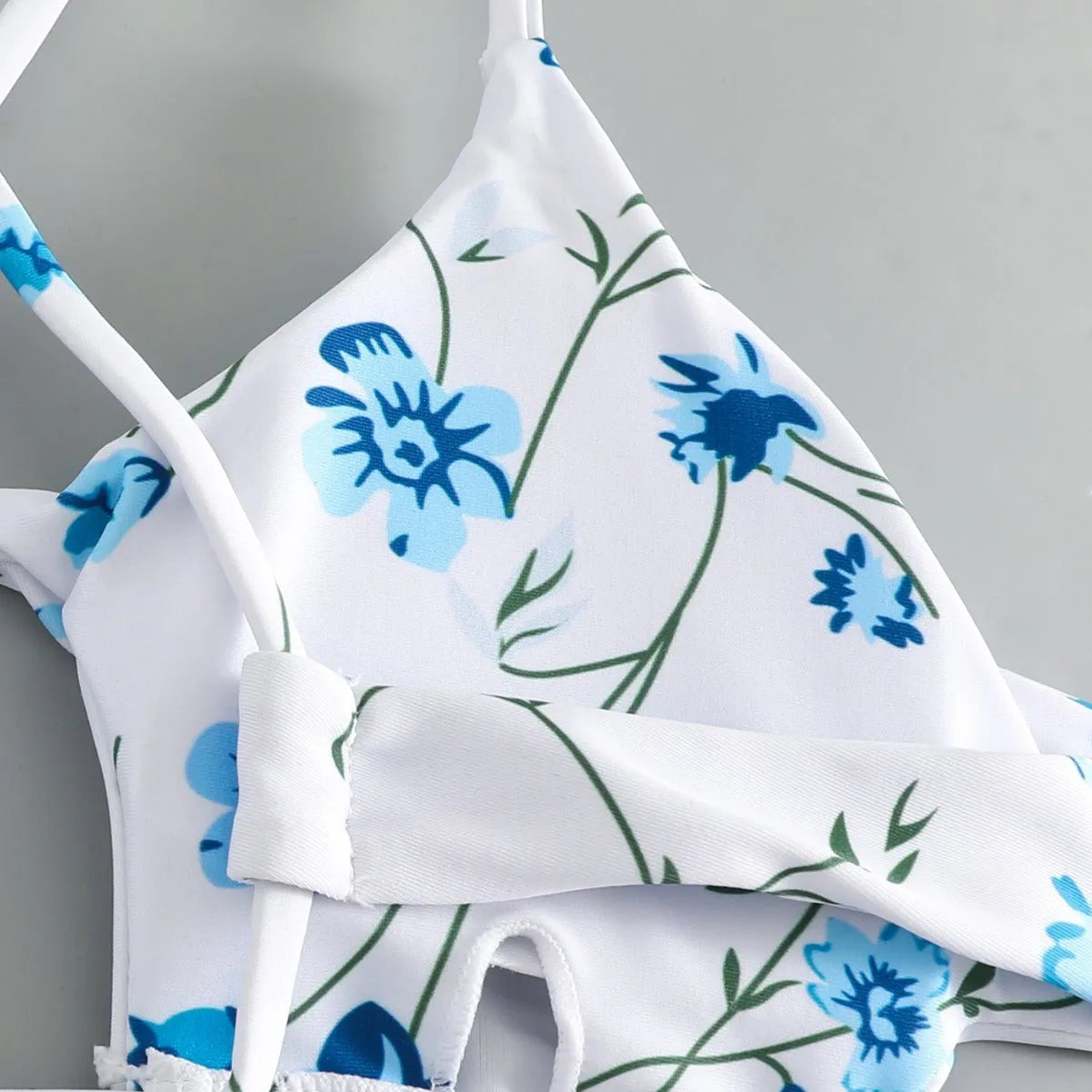 Women's floral tie-neck triangle swimsuit set with polyester-lined top and shorts in multicolour