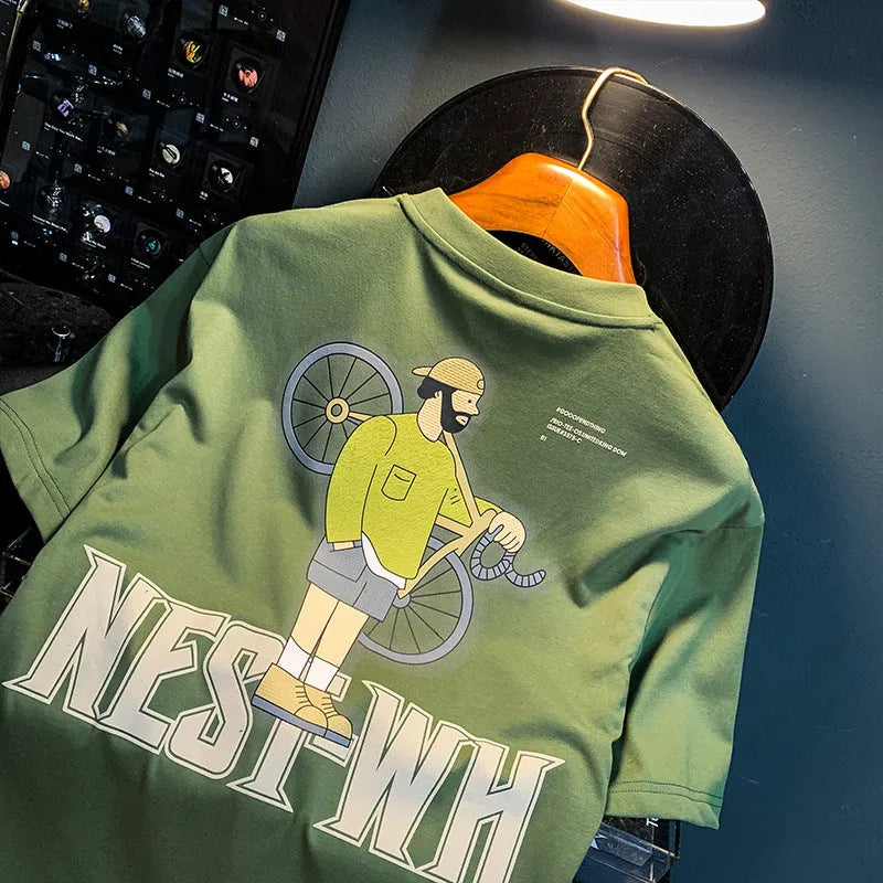 Green loose fit men's t-shirt with a large literary graphic print on the front.