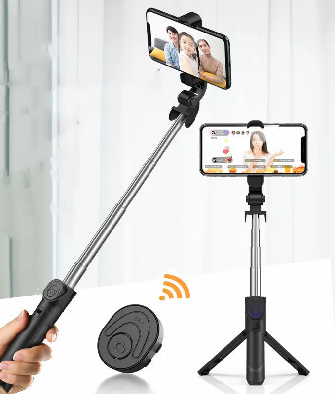 Selfie stick with aluminium alloy body and phone holder in tripod mode on a desk