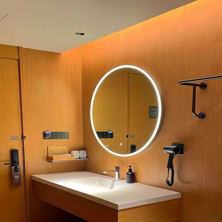 Round black aluminium framed LED bathroom mirror with touch controls for adjustable lighting