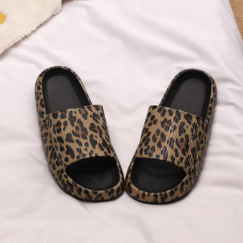 Women's leopard print EVA slippers with thick sole in black, pink, white zebra and khaki animal print colours