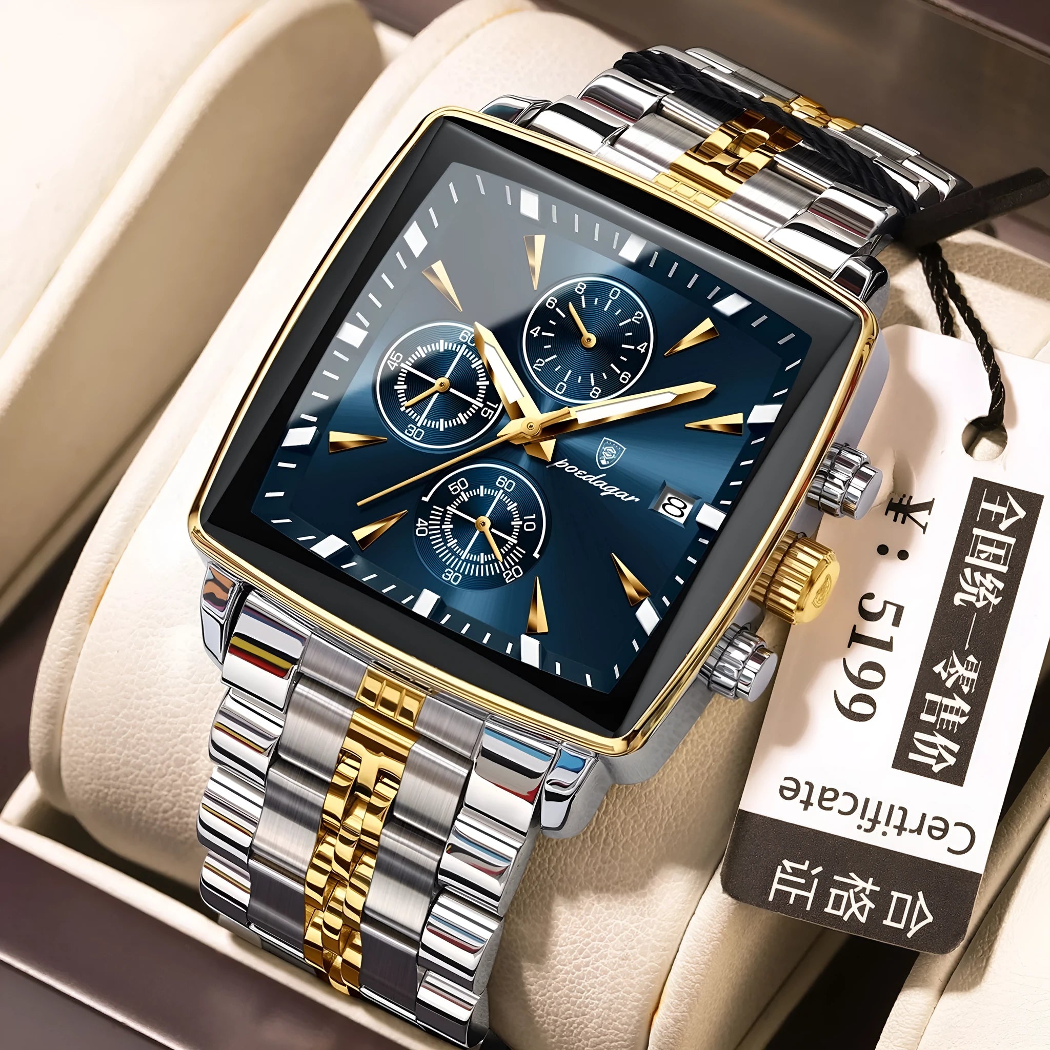 Square faced men's business watch with stainless steel strap on a wrist, showing a gold and blue colour variant.