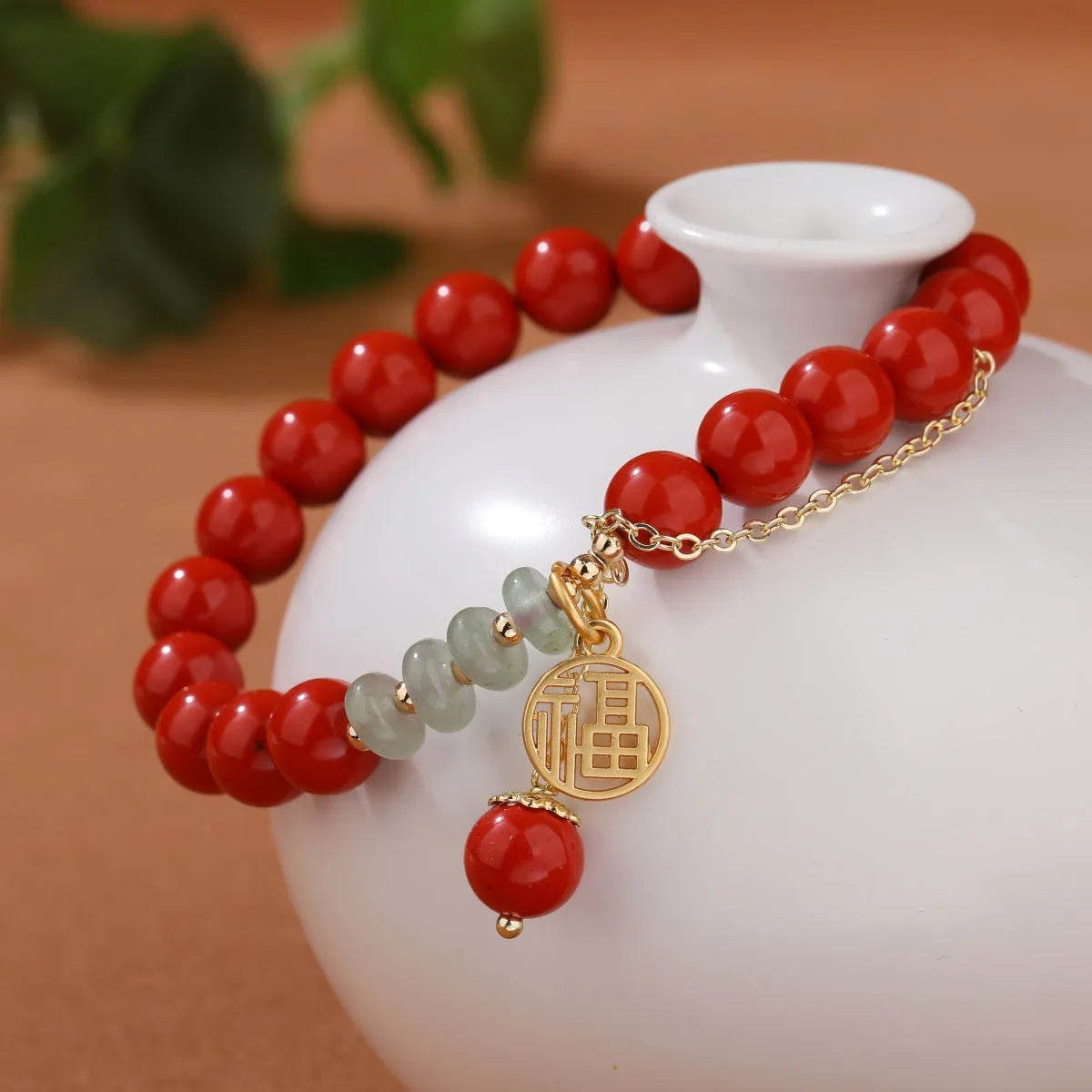 Retro women's cinnabar fu character bracelet with jade spacers and tassel, 8mm beads