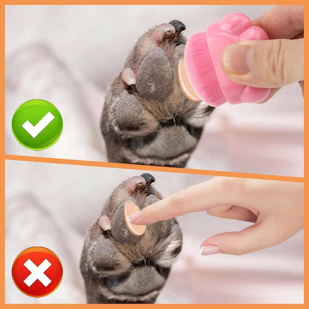Three dog paw balm brushes with soft fibre heads and paw-shaped plastic handles, each in a small clear storage box