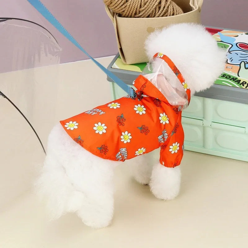 Transparent dog raincoat in orange with pull ring traction on a white background