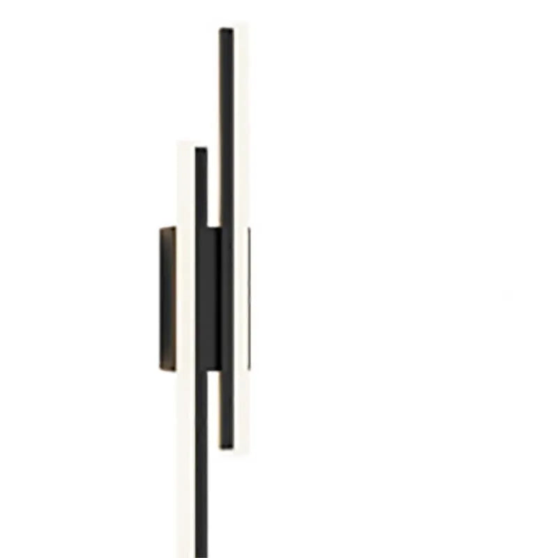 Scandinavian minimalist LED wall light with acrylic shade on black metal arm.