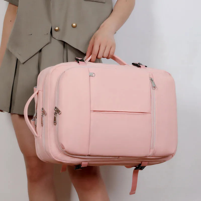 Waterproof Oxford cloth backpack for a 15.6 inch laptop, shown in multiple colours with visible pockets and zippers.