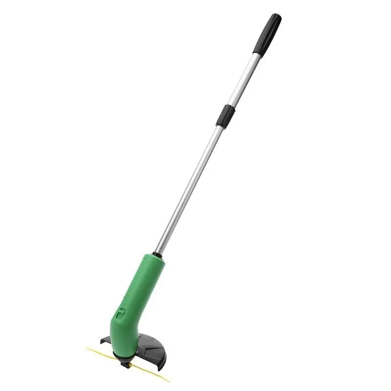 Cordless lawn trimmer with lightweight extension pole and protective debris shield on grass