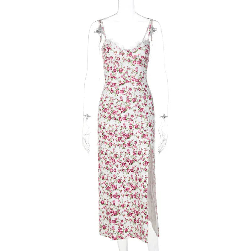 Blue lace floral print women's dress with suspender straps and a high thigh slit.