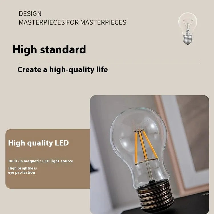 Creative suspension bulb night lamp with iron art construction on black wood grain base