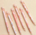 Automatic pencil press 0.5 no sharpening in peach colour with plastic casing and 100 refills