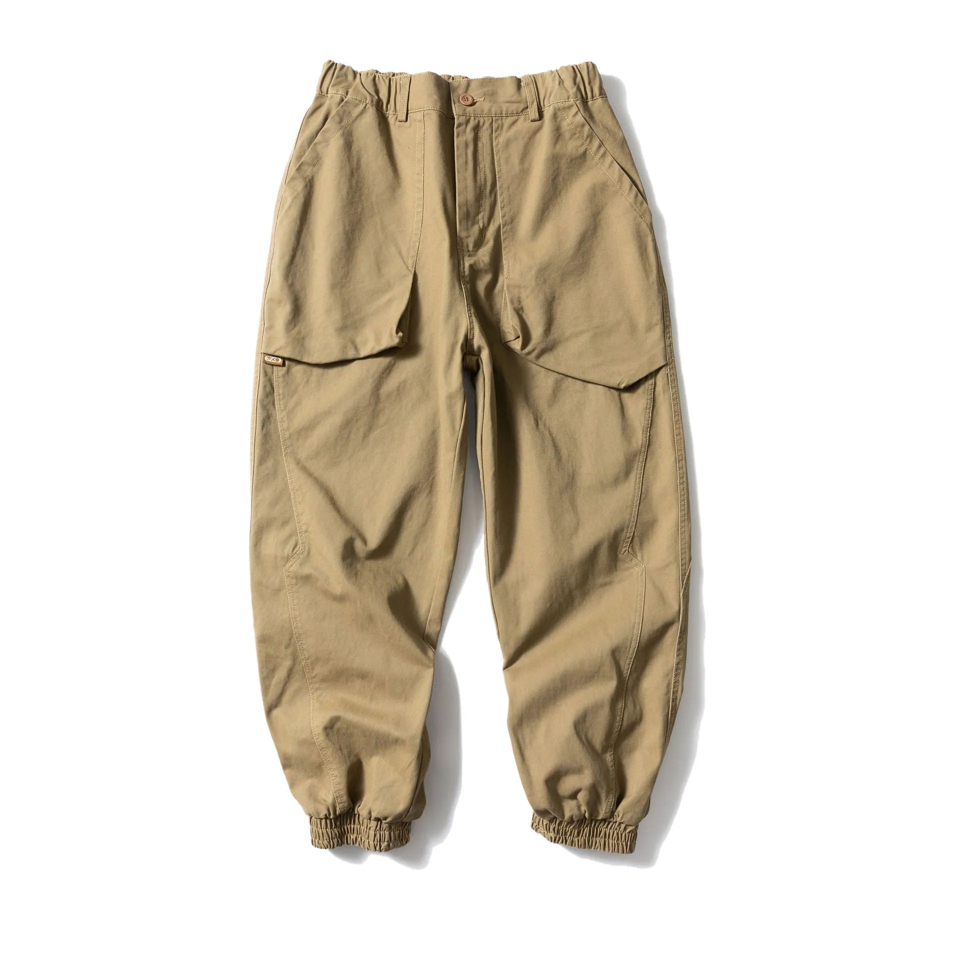 Solid colour cotton tapered casual pants with ankle ties, loose fit, available in black and khaki.