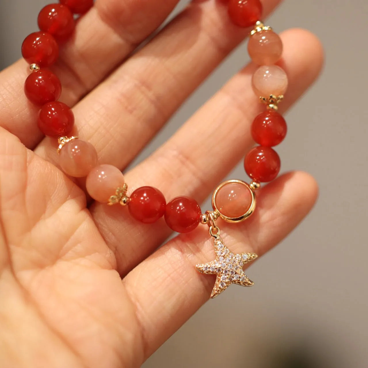 Handmade 8mm red agate star-shaped bracelet for women, ethnic style with Xiangyun design, sands orange finish