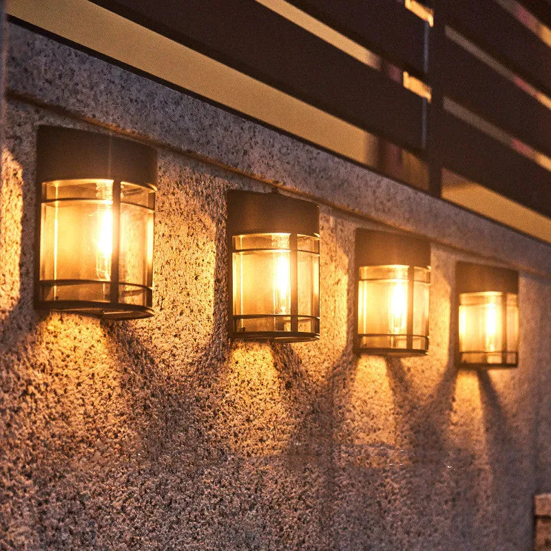 Set of solar outdoor wall lights with warm light, IP65 waterproof, for patio balcony or garden use