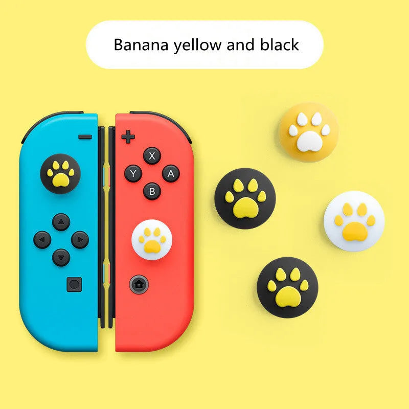 Nintendo Switch Lite with silicone Joycon sleeves and cat claw-shaped rocker caps in assorted colours