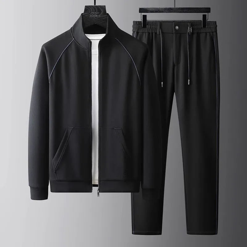 Men's slim fit stand collar casual sports suit set in a choice of colours, featuring a coat and matching trousers.