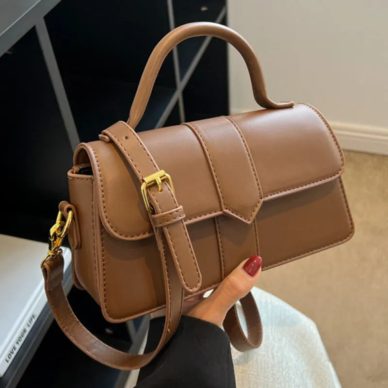 Women's PU leather messenger bag with horizontal square design measuring 22cm wide