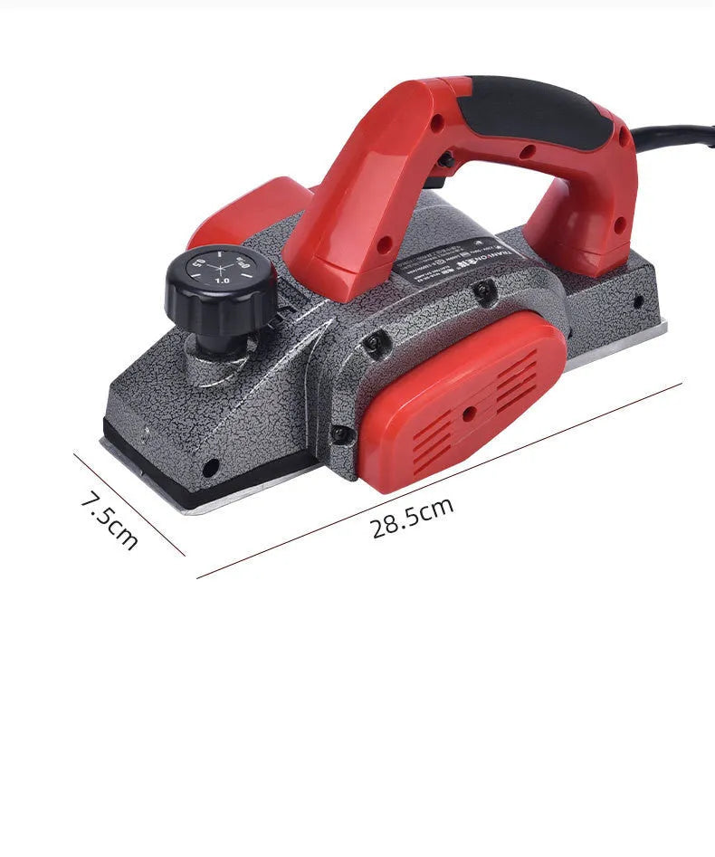 Red desktop electric wood planer with aluminium body showing 82mm planing width and power cord
