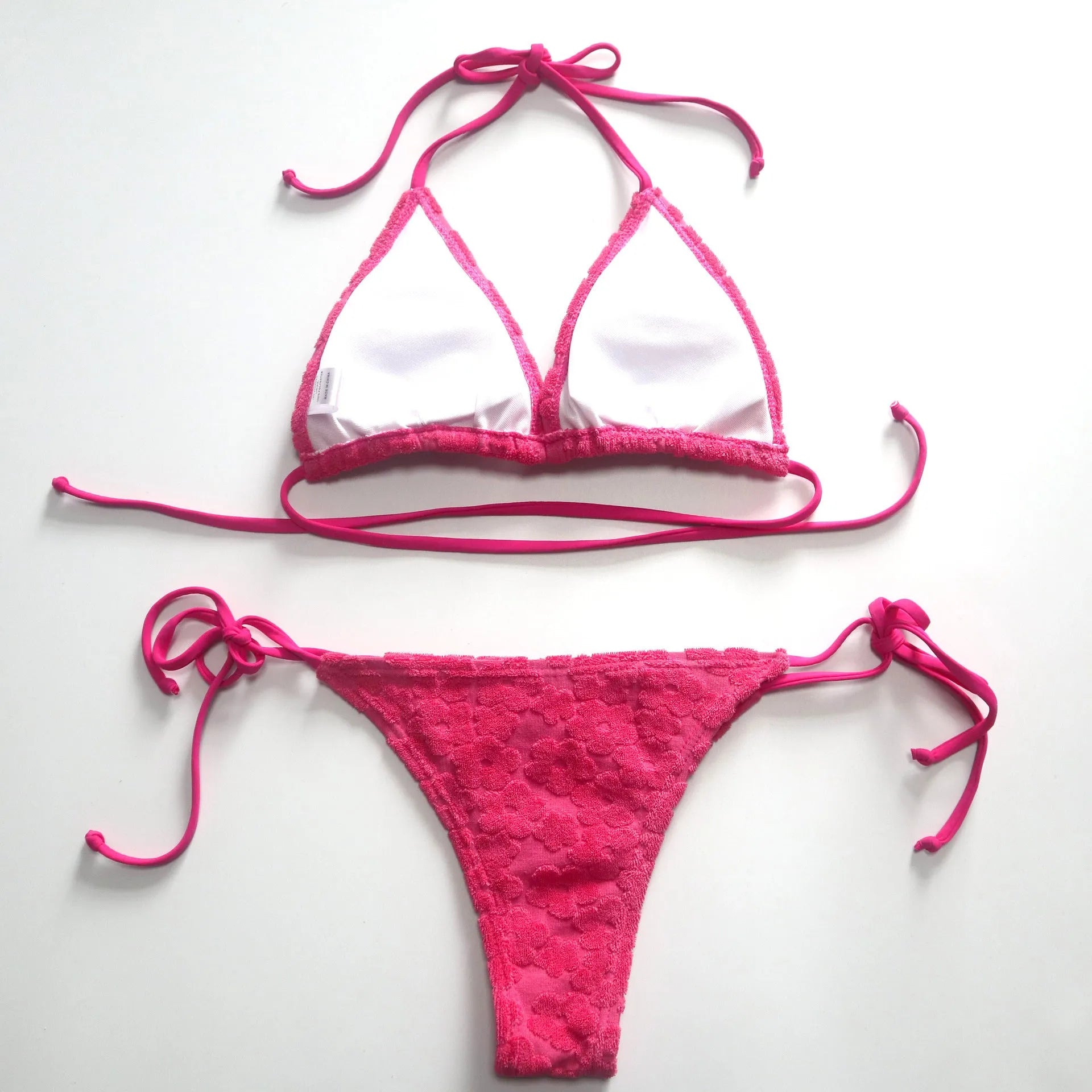 Women's bikini set with triangle lace-up top and skirt bottom, rose red colour, polyester fabric