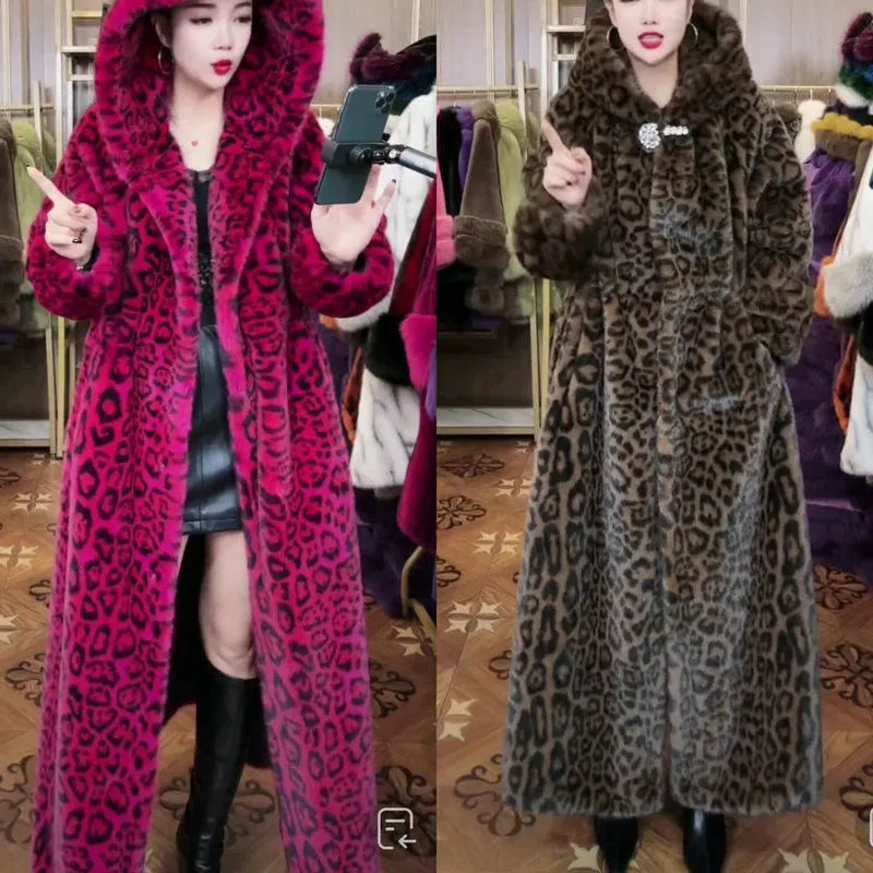 Long brown leopard print faux fur coat on a model, showing its loose fit and 100cm length.