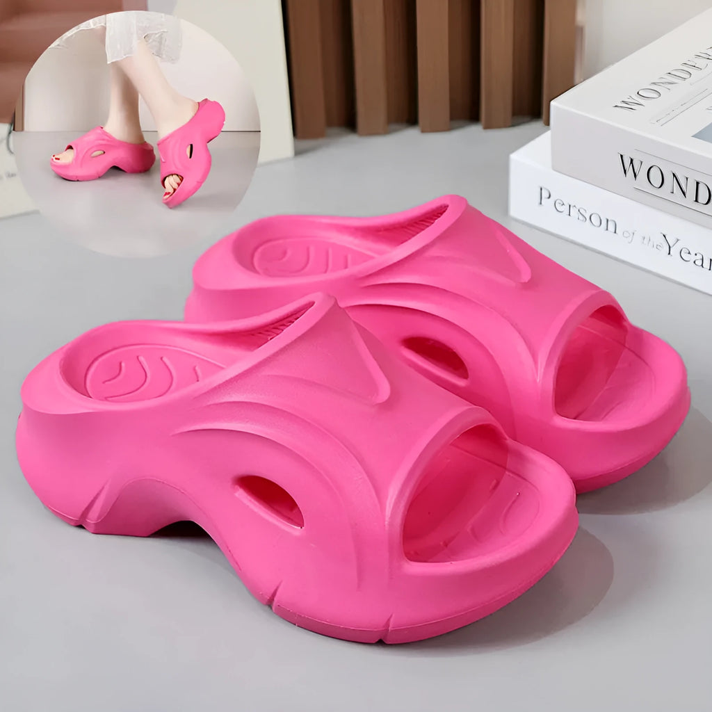 Women's white EVA beach slippers with a thick sole and round toe.