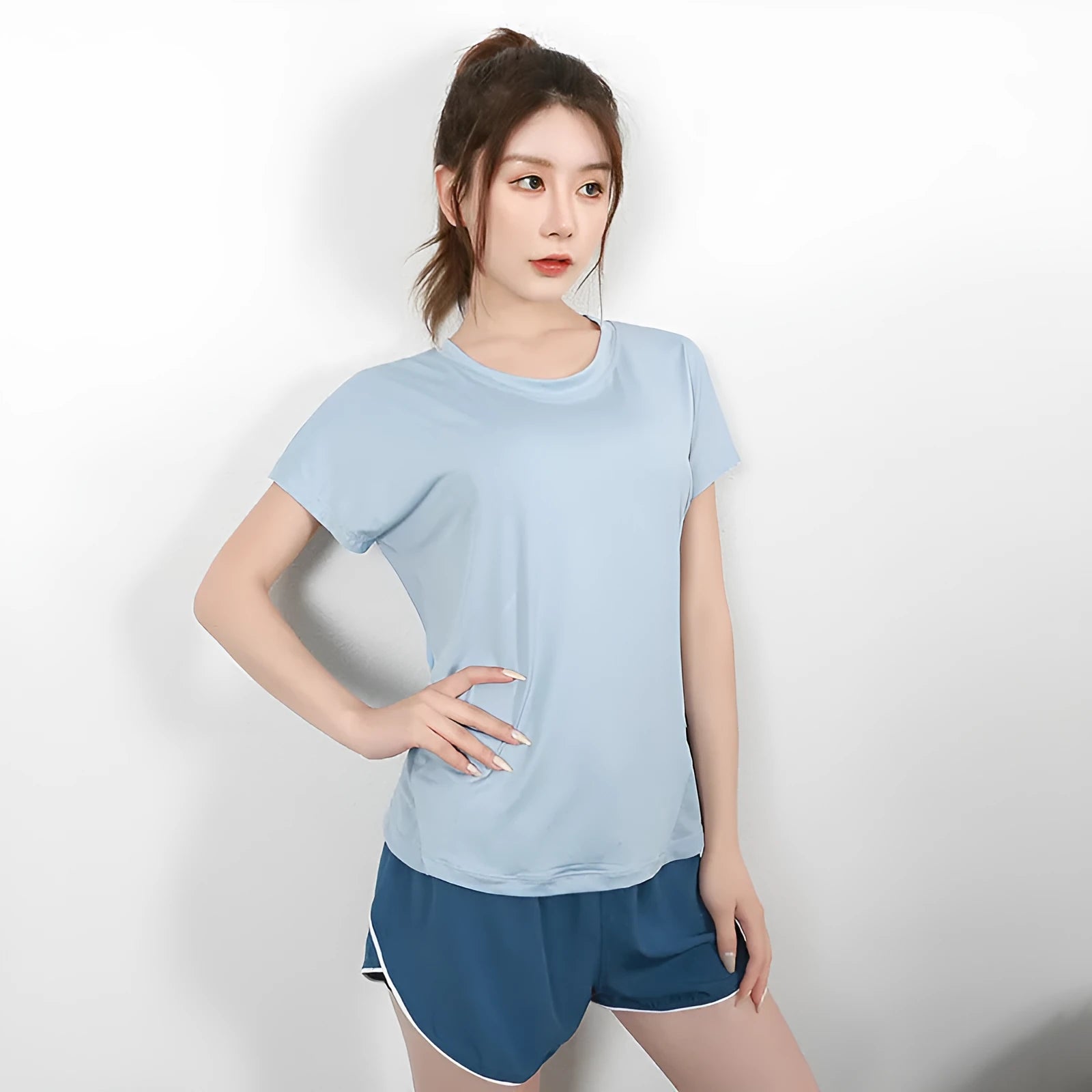 Women's short sleeve polyester sports t-shirt for yoga and running in pink