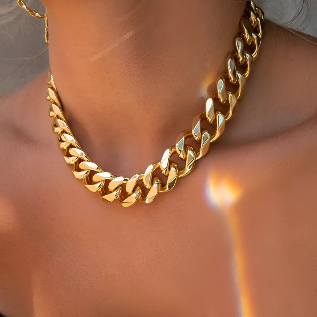 Gold women's thick chain necklace showing 6cm width and 32cm length with electroplated alloy construction