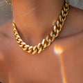 Gold women's thick chain necklace showing 6cm width and 32cm length with electroplated alloy construction